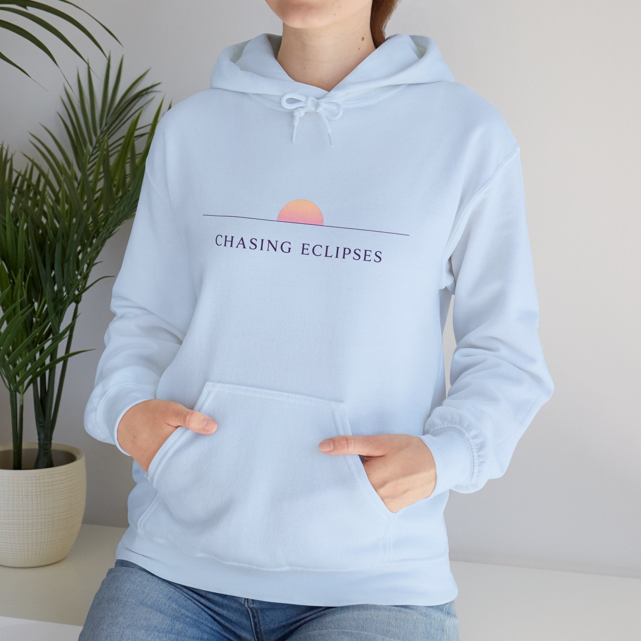 Chasing Eclipses Hoodie — Minimal Sunrise Graphic Pullover