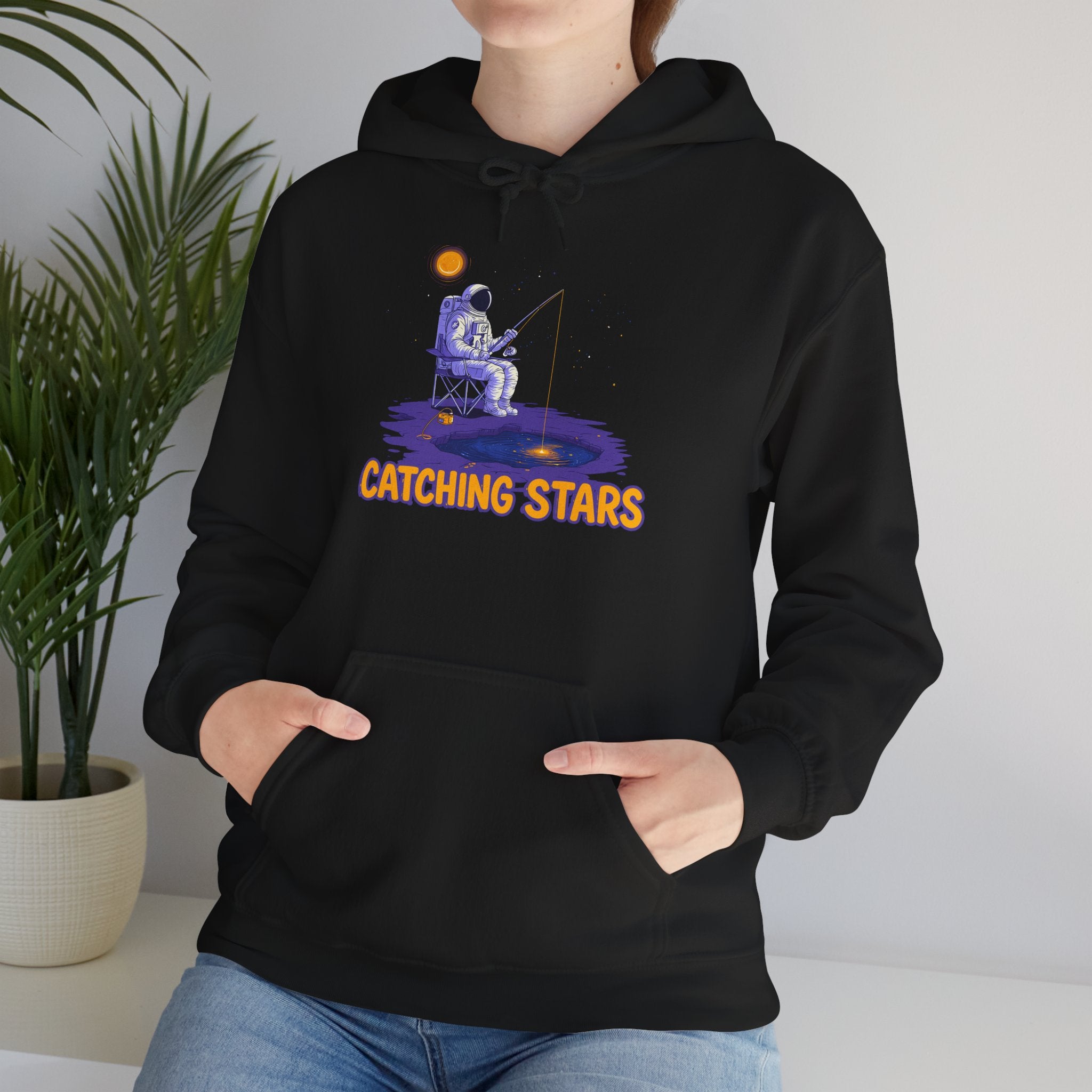 Catching Stars Hoodie — Astronaut Night Sky Graphic Sweatshirt