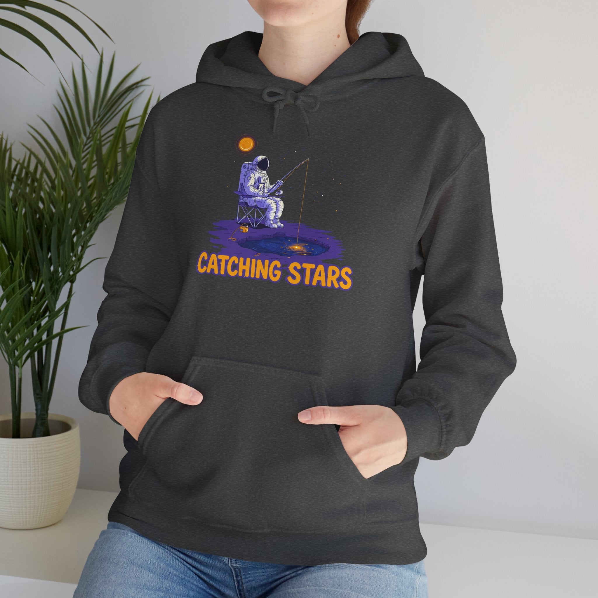 Catching Stars Hoodie — Astronaut Night Sky Graphic Sweatshirt